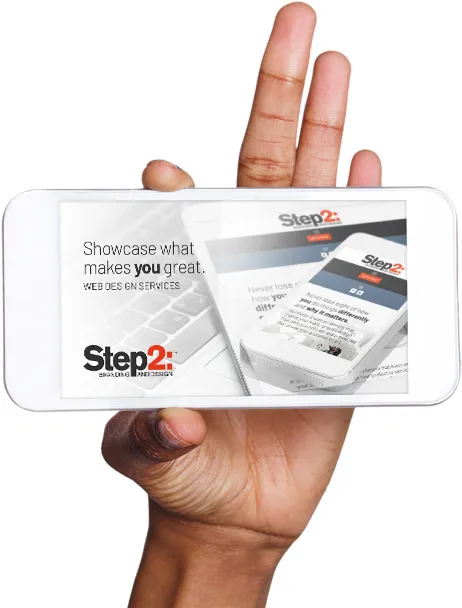 Hand holding smart phone showing website