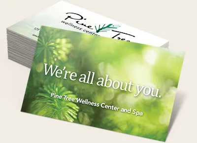 Business card with "We're all about you." tagline