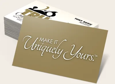 Business card with "Make it Uniquely Yours" tagline